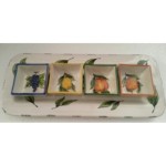 Ceramic tray with square bowls.